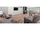 Living room featuring shiplap wall, modern decor, and luxury vinyl plank flooring at 276 Whipple Run Loop, Myrtle Beach, SC 29588