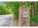 Community entrance sign for Charleston Lakes surrounded by lush greenery at 276 Whipple Run Loop, Myrtle Beach, SC 29588