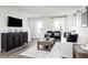 Cozy living room featuring modern decor, stylish furniture, and lots of natural light at 2828 Rowyn St., Longs, SC 29568