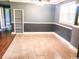 Dining room featuring tile floors, gray walls, breakfast area and bookshelf at 3110 Pinewood Dr., Loris, SC 29569