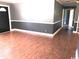 Spacious living room with hardwood flooring, neutral paint, and ample natural light at 3110 Pinewood Dr., Loris, SC 29569