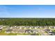 A peaceful residential area with neat rows of houses, showcasing a harmonious living environment with dense woods behind it at 347 Leste Rd., Myrtle Beach, SC 29588