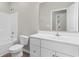 Bathroom featuring white cabinets, a tub-shower combo, and modern fixtures at 347 Leste Rd., Myrtle Beach, SC 29588