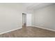 A bright, spacious bedroom featuring wood-look floors and a white door at 347 Leste Rd., Myrtle Beach, SC 29588