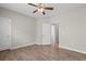 Bedroom featuring wood-look flooring, white doors, and neutral walls at 347 Leste Rd., Myrtle Beach, SC 29588