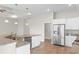 Modern kitchen with stainless steel appliances, granite countertops, and a breakfast bar at 347 Leste Rd., Myrtle Beach, SC 29588