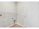 Convenient laundry room with utility connections, storage shelf and access door at 347 Leste Rd., Myrtle Beach, SC 29588