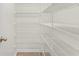 Walk-in pantry with ample shelving for optimal storage and organization at 347 Leste Rd., Myrtle Beach, SC 29588