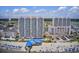 Aerial view of resort towers with beach access, pool, and beautiful waterfront setting at 3500 N Ocean Blvd. # 701 702, North Myrtle Beach, SC 29582