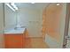 Clean bathroom featuring a tiled floor, vanity, and shower with curtain at 3500 N Ocean Blvd. # 701 702, North Myrtle Beach, SC 29582