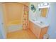 Well-lit bathroom featuring a combination tub and shower, vanity sink, and tiled floor at 3500 N Ocean Blvd. # 701 702, North Myrtle Beach, SC 29582