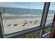 Beautiful view of the beach, ocean, and pier from the condo's window at 3500 N Ocean Blvd. # 701 702, North Myrtle Beach, SC 29582