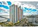 Beautiful high-rise resort with balconies overlooks a stunning ocean view and nearby pier at 3500 N Ocean Blvd. # 701 702, North Myrtle Beach, SC 29582