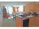 Open-concept kitchen flows into the living area with ocean views and dining space at 3500 N Ocean Blvd. # 701 702, North Myrtle Beach, SC 29582