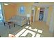Comfortable living room with a sofa and a view into the bedroom and bathroom at 3500 N Ocean Blvd. # 701 702, North Myrtle Beach, SC 29582