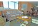 Relaxing living area with ocean view, beachy decor, and comfortable seating arrangement at 3500 N Ocean Blvd. # 701 702, North Myrtle Beach, SC 29582