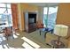 Comfortable condo living room with balcony access and attractive furnishings at 3500 N Ocean Blvd. # 701 702, North Myrtle Beach, SC 29582