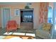 Cozy living room featuring comfortable seating, a TV, and balcony access at 3500 N Ocean Blvd. # 701 702, North Myrtle Beach, SC 29582