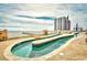 Lazy river pool with building and ocean view at 3500 N Ocean Blvd. # 701 702, North Myrtle Beach, SC 29582