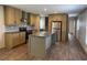 Modern kitchen with center island, stainless steel appliances, and ample cabinet space at 364 Jamie Rd., Galivants Ferry, SC 29544