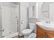 Well-maintained bathroom featuring a shower and wood vanity with ample lighting at 4105 S Ocean Blvd. # 102, North Myrtle Beach, SC 29582