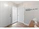 Inviting hallway with wood flooring, stylish decor, and ample natural light at 4105 S Ocean Blvd. # 102, North Myrtle Beach, SC 29582