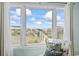 Lovely ocean view from a light and airy room with a comfortable place to sit and enjoy the scenery at 4105 S Ocean Blvd. # 102, North Myrtle Beach, SC 29582