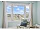 Charming view from the cozy chair offers a peek at the beach and sky at 4105 S Ocean Blvd. # 102, North Myrtle Beach, SC 29582