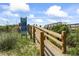 Wooden walkway to the beach with a sign showing the beach regulations at 4105 S Ocean Blvd. # 102, North Myrtle Beach, SC 29582