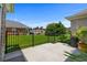 View of the fenced-in back patio surrounded by green grass at 4162 Dupree Dr., Little River, SC 29566