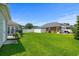 Well-maintained backyard with lush lawn and privacy fence, perfect for outdoor activities at 4162 Dupree Dr., Little River, SC 29566