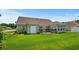 Spacious backyard featuring a manicured lawn, brick exterior, and potential for outdoor living at 4162 Dupree Dr., Little River, SC 29566