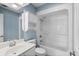 Clean bathroom featuring a single vanity, built-in storage, toilet, and shower with bathtub at 4162 Dupree Dr., Little River, SC 29566