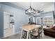 Open-concept dining area connecting to the living room and kitchen at 4162 Dupree Dr., Little River, SC 29566