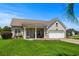 Charming single-story home with a well-manicured lawn and attached two-car garage at 4162 Dupree Dr., Little River, SC 29566