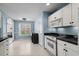Cozy kitchen area with window views and modern appliances at 4162 Dupree Dr., Little River, SC 29566