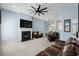 Bright and open living space with plush seating, and a large fireplace at 4162 Dupree Dr., Little River, SC 29566