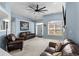 Inviting living room with fireplace, large windows and comfortable seating for Gathering and guests at 4162 Dupree Dr., Little River, SC 29566