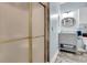 Bathroom featuring a vanity and shower with decorative tiles and finishes at 4221 Hibiscus Dr. # 8-203, Little River, SC 29566