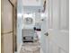 Bathroom features a glass door shower, gray vanity, and tiled floors at 4221 Hibiscus Dr. # 8-203, Little River, SC 29566