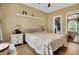 Bedroom with hardwood floors, warm walls, and a built-in closet at 4221 Hibiscus Dr. # 8-203, Little River, SC 29566