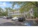 Exterior view of a building with covered patios and a parking lot at 4221 Hibiscus Dr. # 8-203, Little River, SC 29566