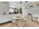 Open concept kitchen and living room with coastal décor and tile floors at 4221 Hibiscus Dr. # 8-203, Little River, SC 29566
