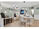 Inviting living room featuring tile floors, a ceiling fan, and access to a charming outdoor patio area at 4221 Hibiscus Dr. # 8-203, Little River, SC 29566