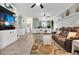 Open-concept living space with tile flooring and tasteful decor at 4221 Hibiscus Dr. # 8-203, Little River, SC 29566