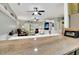 Bright living room with tile floors, ceiling fans, and access to the outdoors at 4221 Hibiscus Dr. # 8-203, Little River, SC 29566