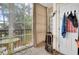 Enclosed patio with tile flooring, large windows, and an inviting seating area at 4221 Hibiscus Dr. # 8-203, Little River, SC 29566