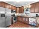 Beautiful kitchen featuring stainless steel appliances, granite countertops, white subway tile backsplash and wood flooring at 4387 Landing Rd., Little River, SC 29566