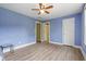 Bedroom featuring luxury vinyl flooring, recessed lighting, neutral paint, and two closets at 4691 Mill Pond Rd., Murrells Inlet, SC 29576