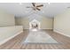 Spacious bonus room with recessed lighting, wood-look floors, and a dining table in the background at 4691 Mill Pond Rd., Murrells Inlet, SC 29576